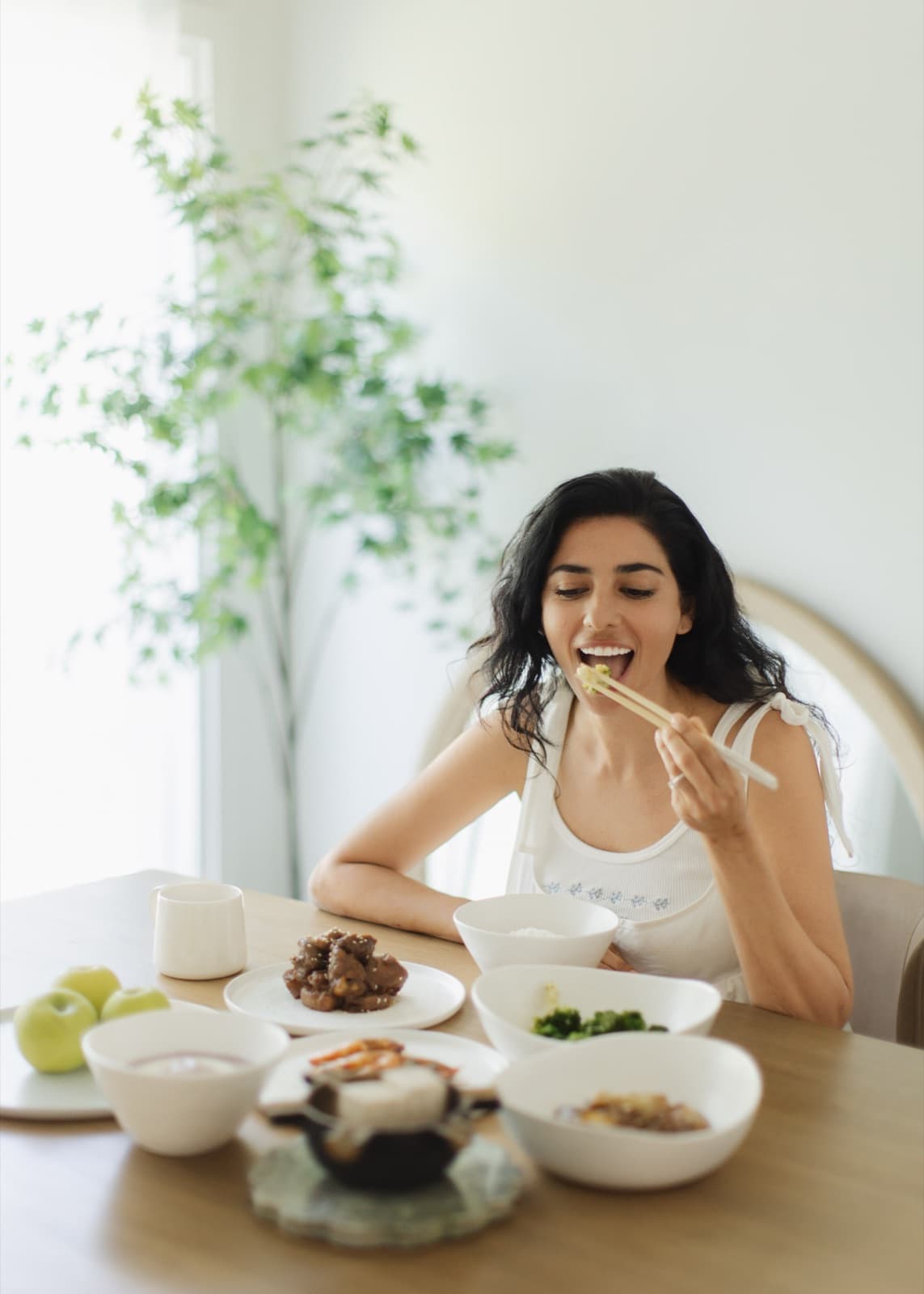 A mother enjoying a nourishing meal at home